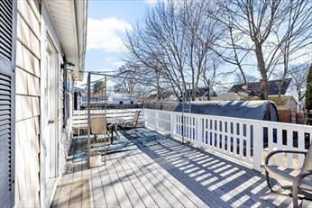 44 Holmes Road Dedham, MA 02026 - Photo 24 of 24 a view of balcony with wooden floor