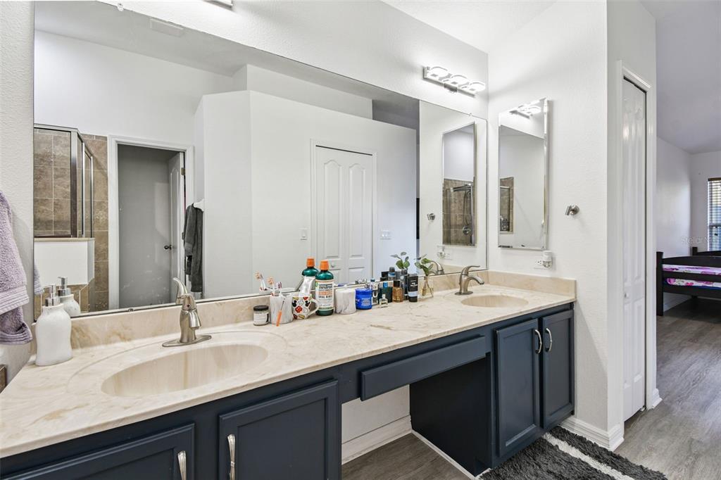 11478 Weston Course Loop Riverview, FL 33579 - Photo 18 of 30 a bathroom with a sink double vanity and a mirror