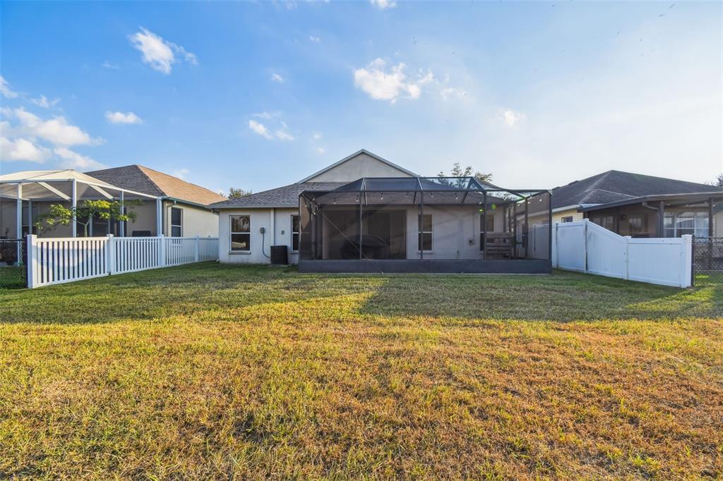 11478 Weston Course Loop Riverview, FL 33579 - Photo 26 of 30 a front view of a house with a garden
