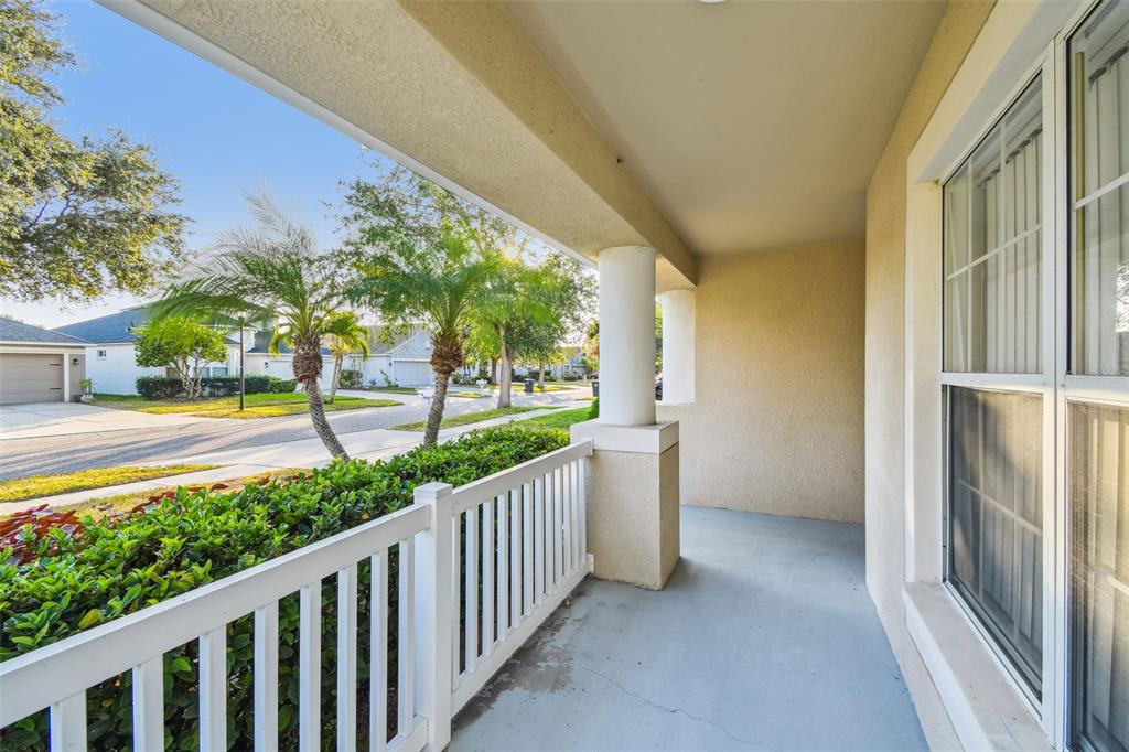 11478 Weston Course Loop Riverview, FL 33579 - Photo 5 of 30 a view of a porch with wooden floor and fence