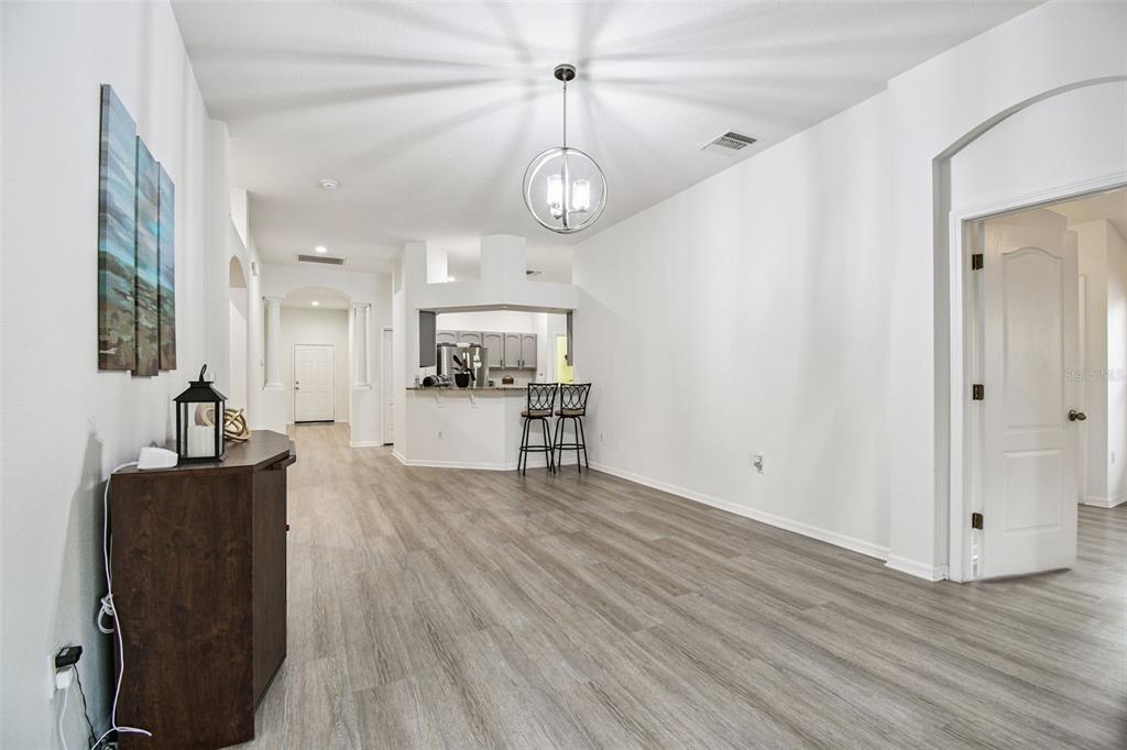 11478 Weston Course Loop Riverview, FL 33579 - Photo 10 of 30 a view of living room with furniture and wooden floor
