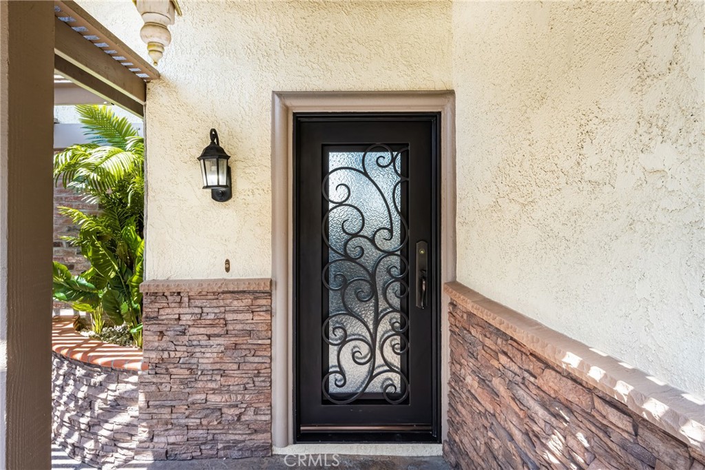 5554 East Vista Del Rio Anaheim, CA 92807 - Photo 6 of 42 a view of a door with a door