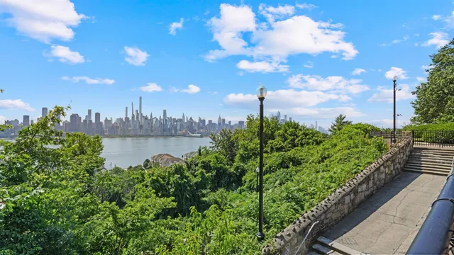 a view of a lake with a city view