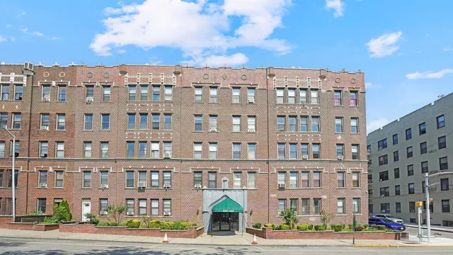 a view of a building with a street