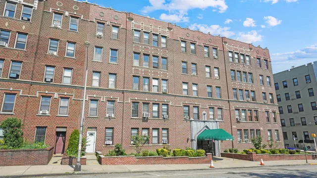 a front view of a building with street view