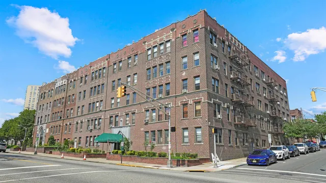 a view of a building with a street