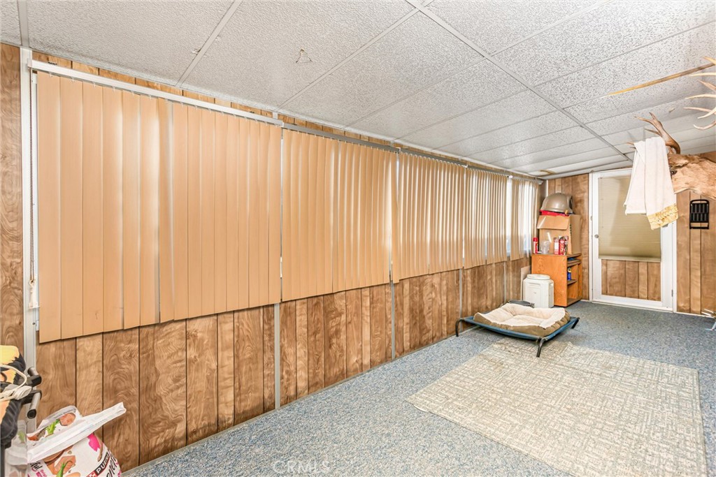 4000 Pierce Street, Unit 106 Riverside, CA 92505 - Photo 15 of 18 a living room with a window