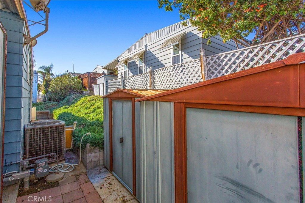 4000 Pierce Street, Unit 106 Riverside, CA 92505 - Photo 17 of 18 a backyard of a house with table and chairs
