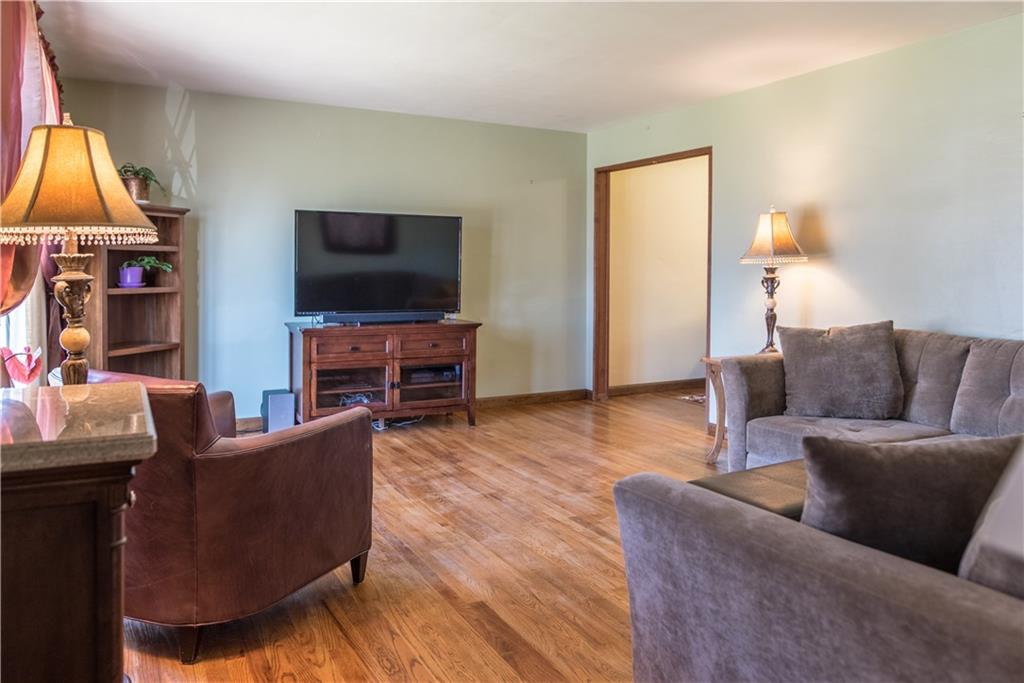 333 West Bruceton Road Pittsburgh, PA 15236 - Photo 2 of 18 Spacious living room with hardwood floors in great condition.