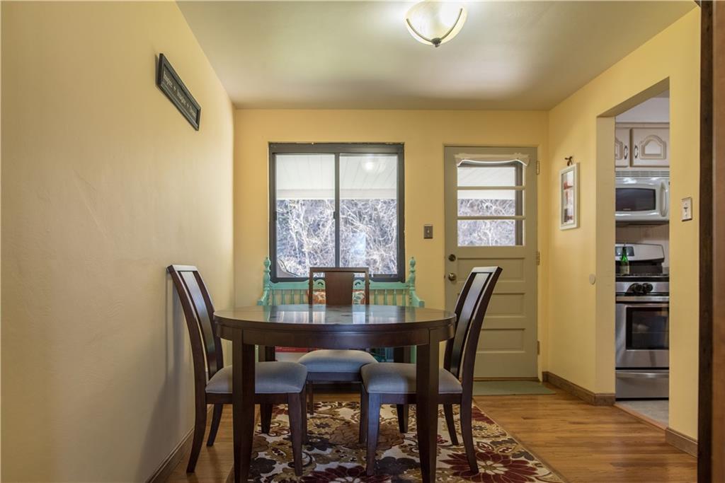 333 West Bruceton Road Pittsburgh, PA 15236 - Photo 4 of 18 Dining room also with hardwood floors and neutral paint colors.