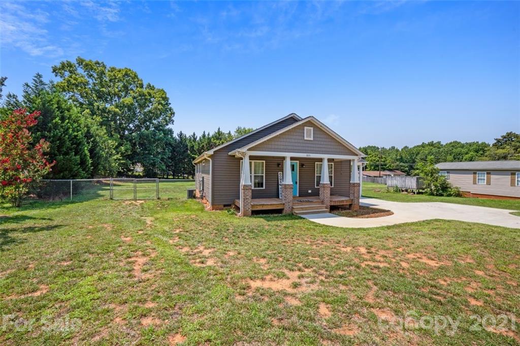 225 Stone Road Salisbury, NC 28146 - Photo 2 of 21 a front view of a house with garden