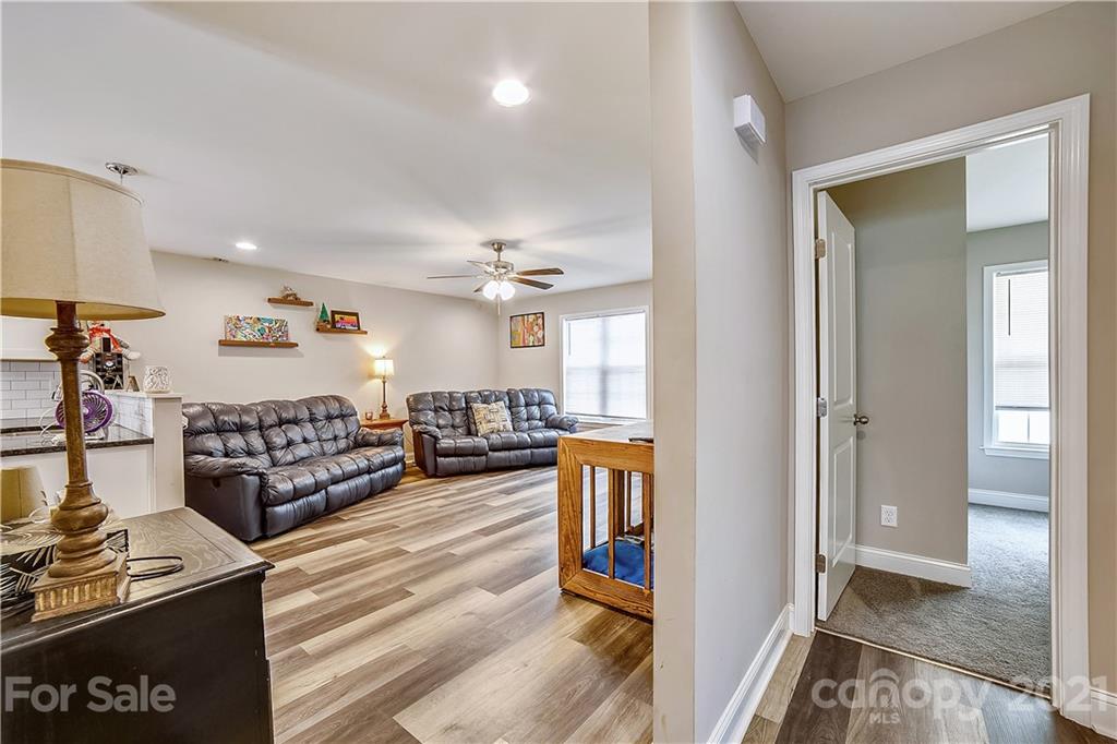 225 Stone Road Salisbury, NC 28146 - Photo 11 of 21 a living room with furniture and wooden floor