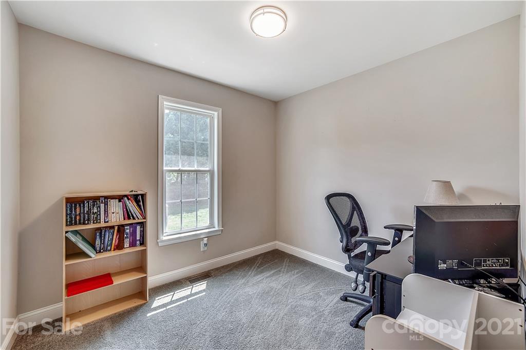 225 Stone Road Salisbury, NC 28146 - Photo 15 of 21 a workspace with furniture hardwood and a window