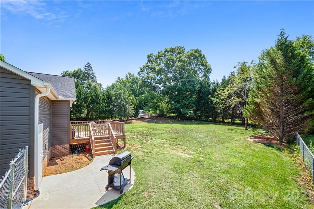 225 Stone Road Salisbury, NC 28146 - Photo 19 of 21 a backyard of a house with seating space