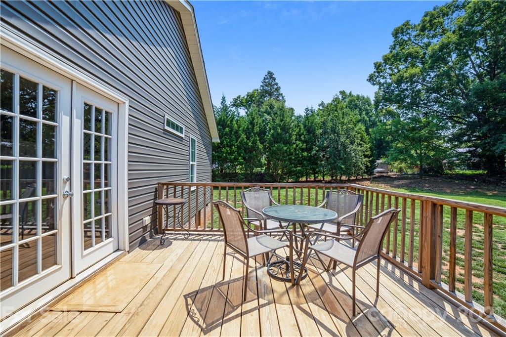 225 Stone Road Salisbury, NC 28146 - Photo 20 of 21 a view of balcony with a potted plant and outdoor seating
