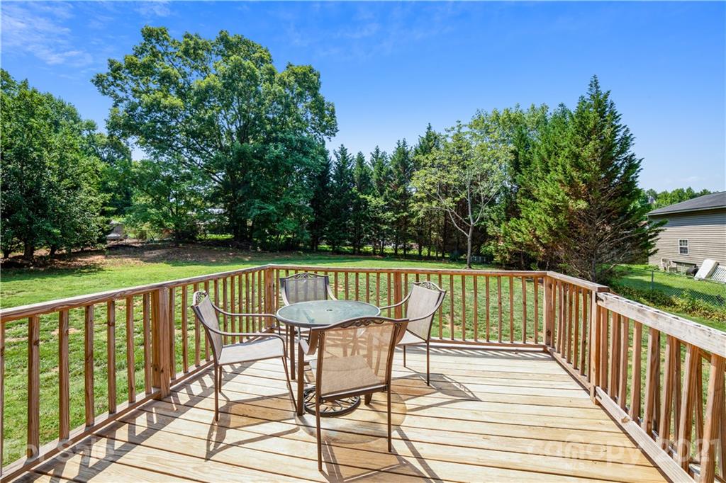 225 Stone Road Salisbury, NC 28146 - Photo 21 of 21 a view of balcony with wooden floor and fence