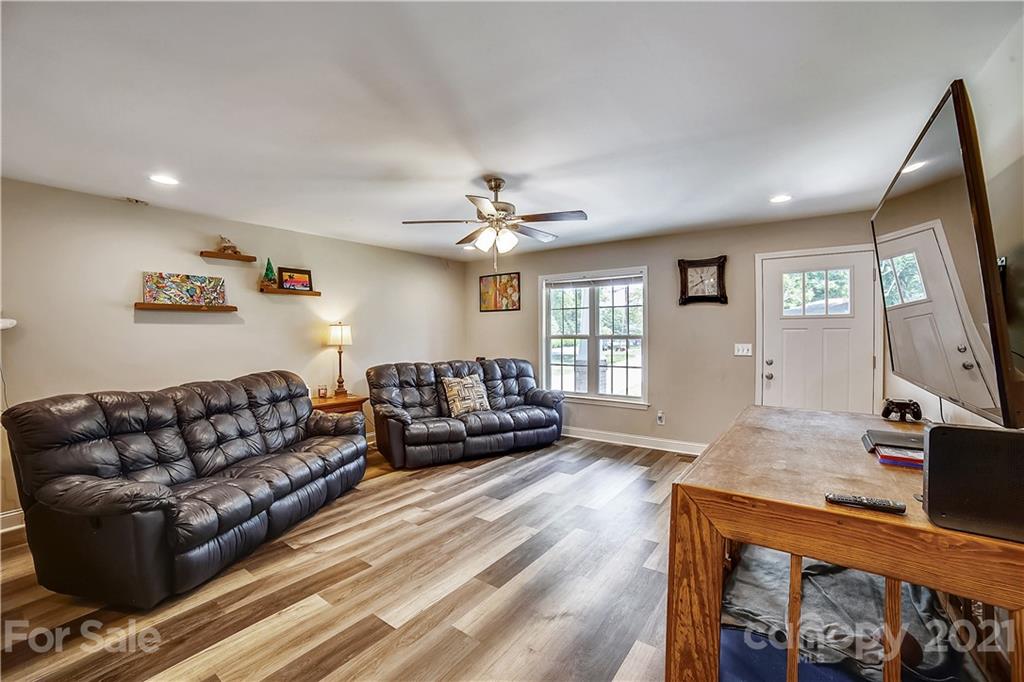 225 Stone Road Salisbury, NC 28146 - Photo 10 of 21 a living room with furniture and a flat screen tv