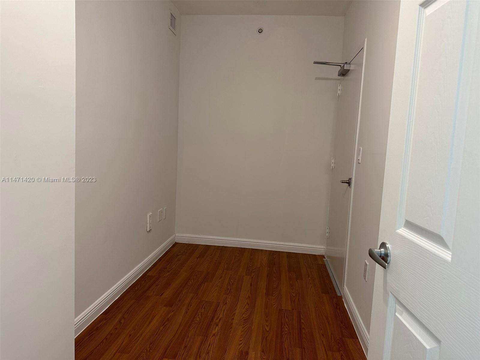 Silver Bluff Estates Miami, FL 33145 - Photo 12 of 27 a view of a room with wooden floor