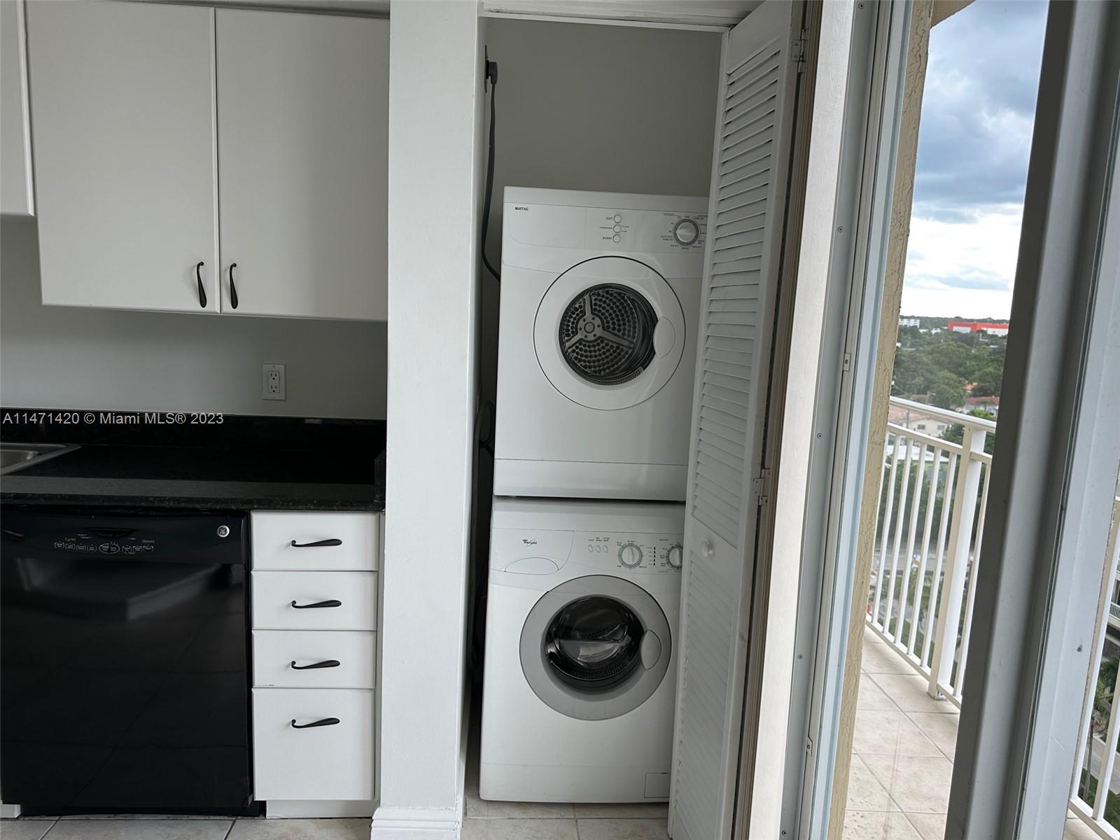 Silver Bluff Estates Miami, FL 33145 - Photo 17 of 27 a utility room with dryer and washer