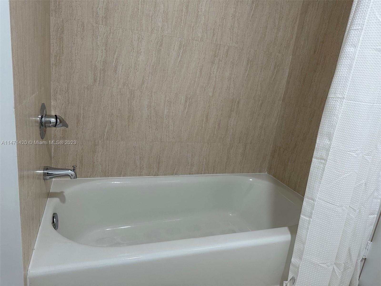 Silver Bluff Estates Miami, FL 33145 - Photo 22 of 27 a bathroom with a bathtub