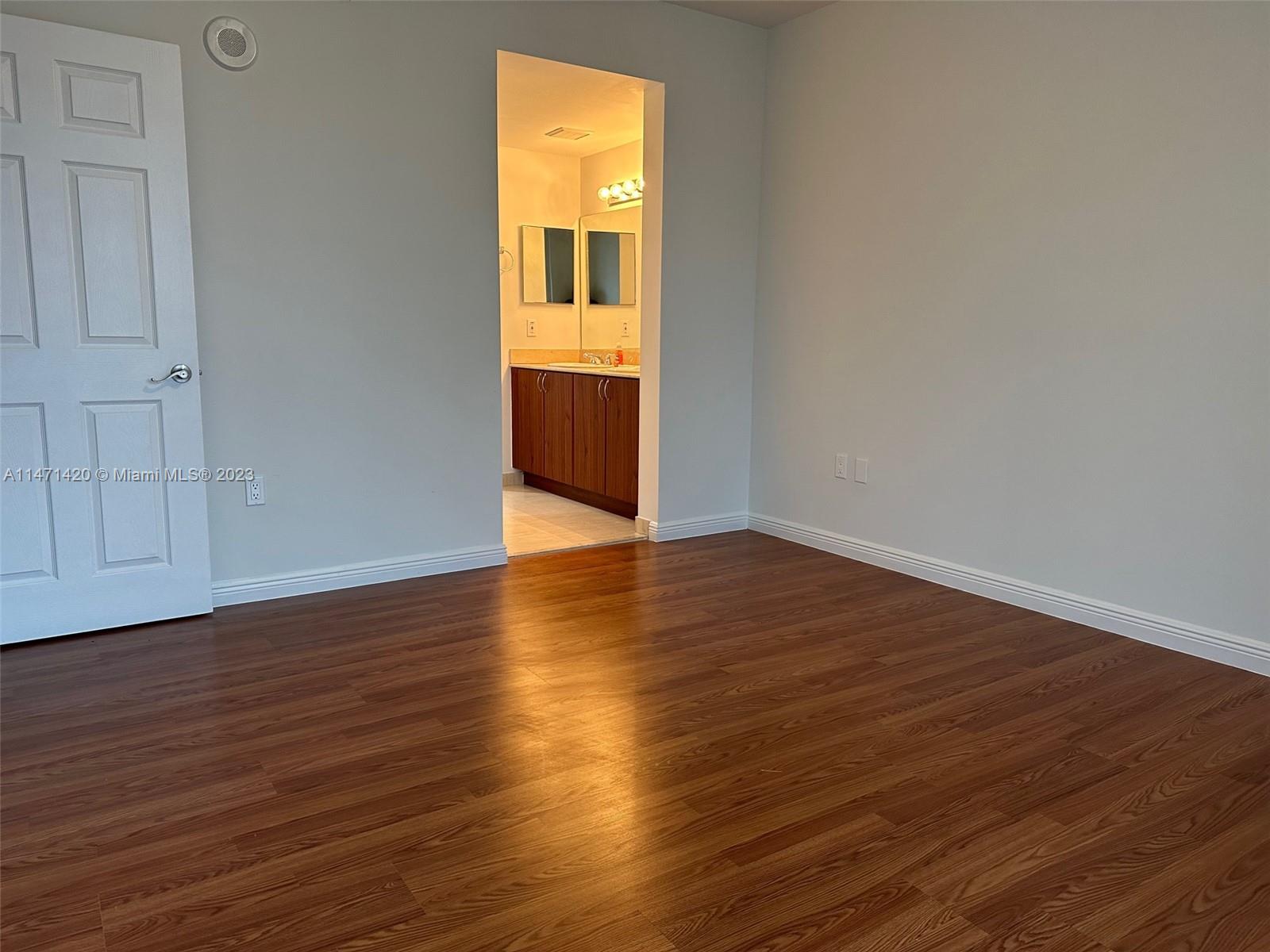 Silver Bluff Estates Miami, FL 33145 - Photo 23 of 27 a view of empty room with wooden floor and fan