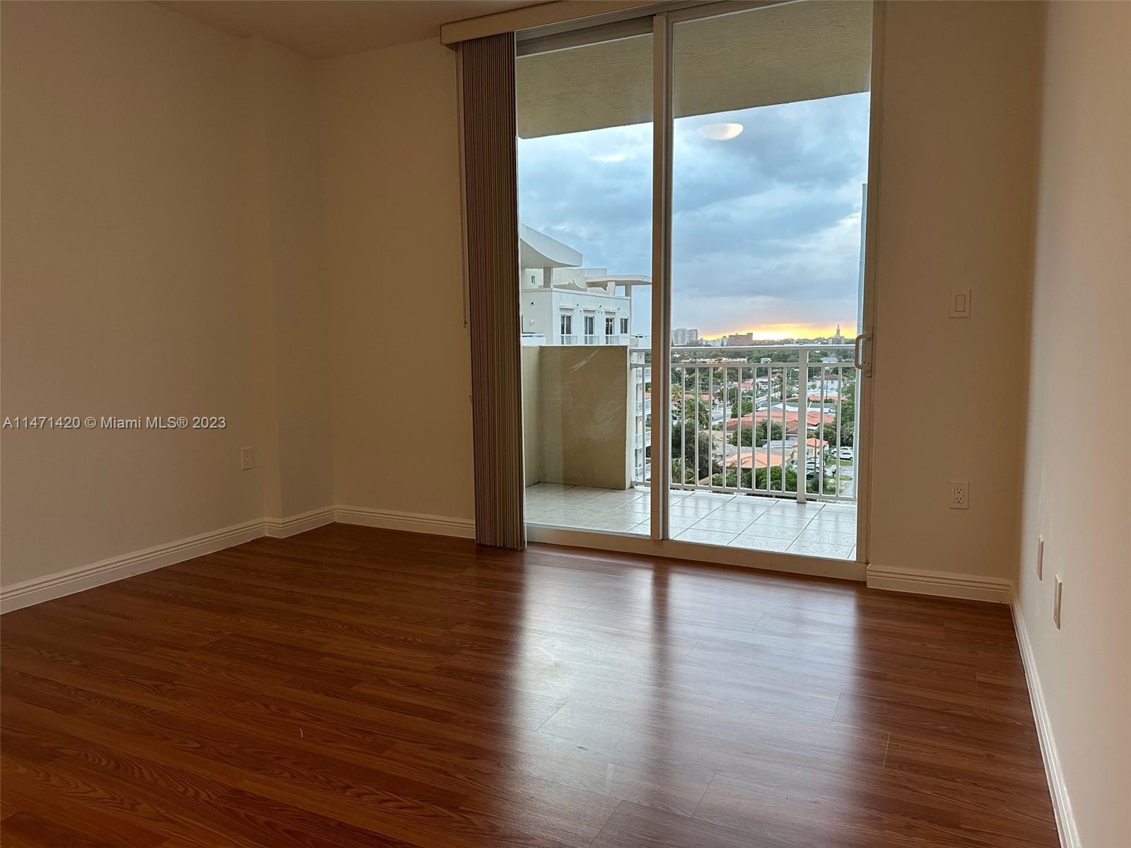 Silver Bluff Estates Miami, FL 33145 - Photo 27 of 27 a view of an empty room with wooden floor and a window