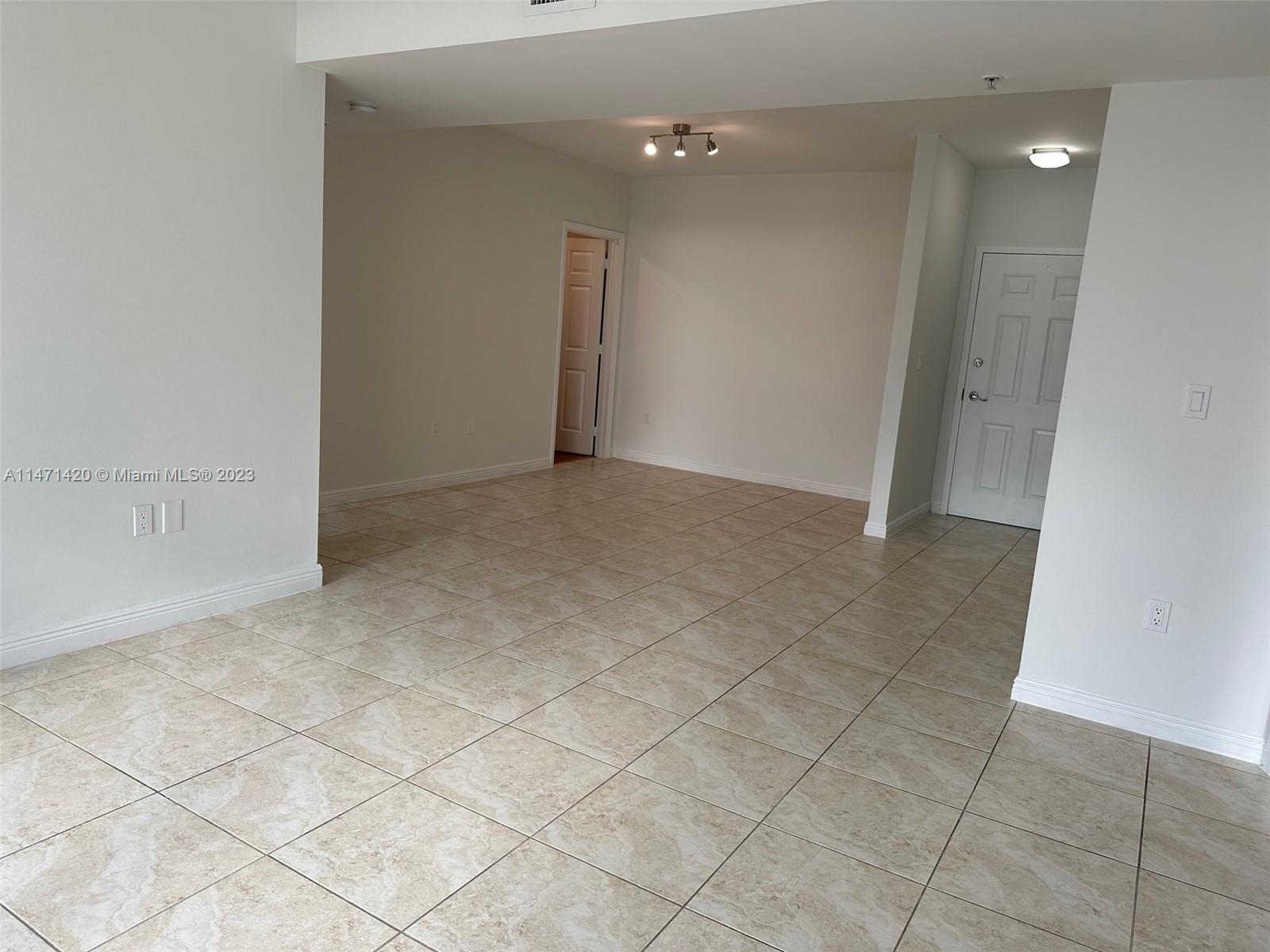 Silver Bluff Estates Miami, FL 33145 - Photo 5 of 27 an empty room with white walls