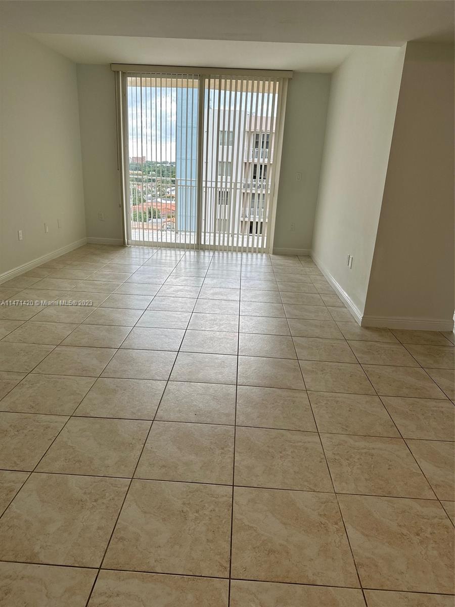 Silver Bluff Estates Miami, FL 33145 - Photo 6 of 27 a view of a livingroom with a floor to ceiling window and bathroom