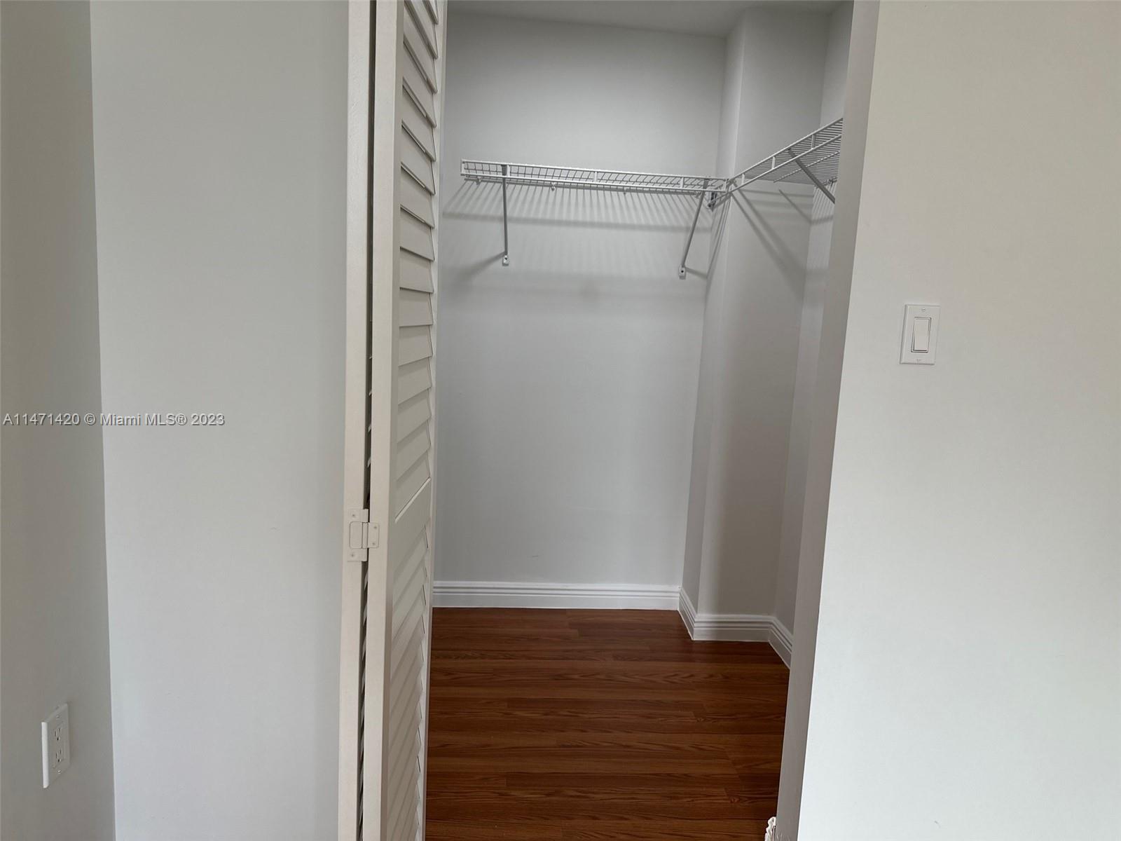 Silver Bluff Estates Miami, FL 33145 - Photo 10 of 27 a view of an empty walk in closet