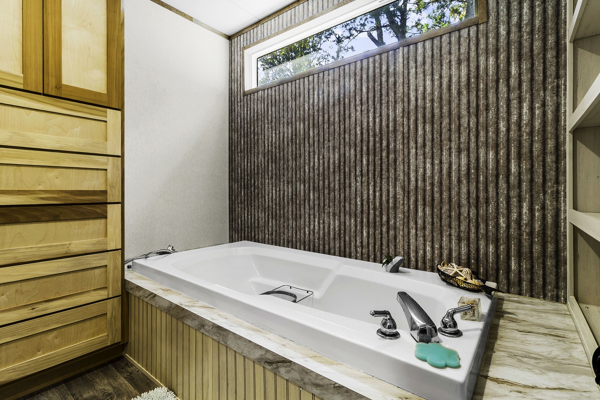 41 Ferguson Way Point Blank, TX 77364 - Photo 22 of 34 a bathroom with a tub and shower