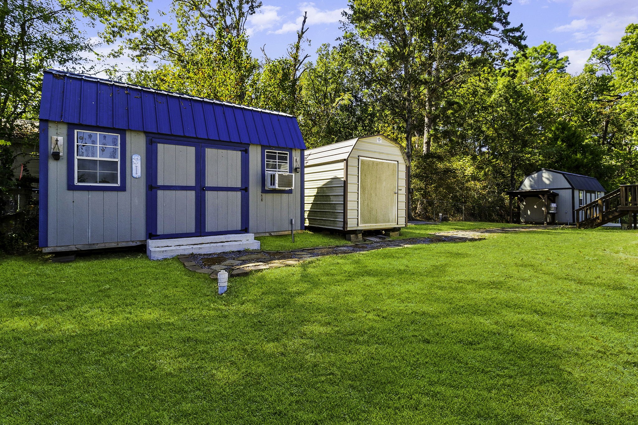 41 Ferguson Way Point Blank, TX 77364 - Photo 26 of 34 a backyard of a house with table and chairs