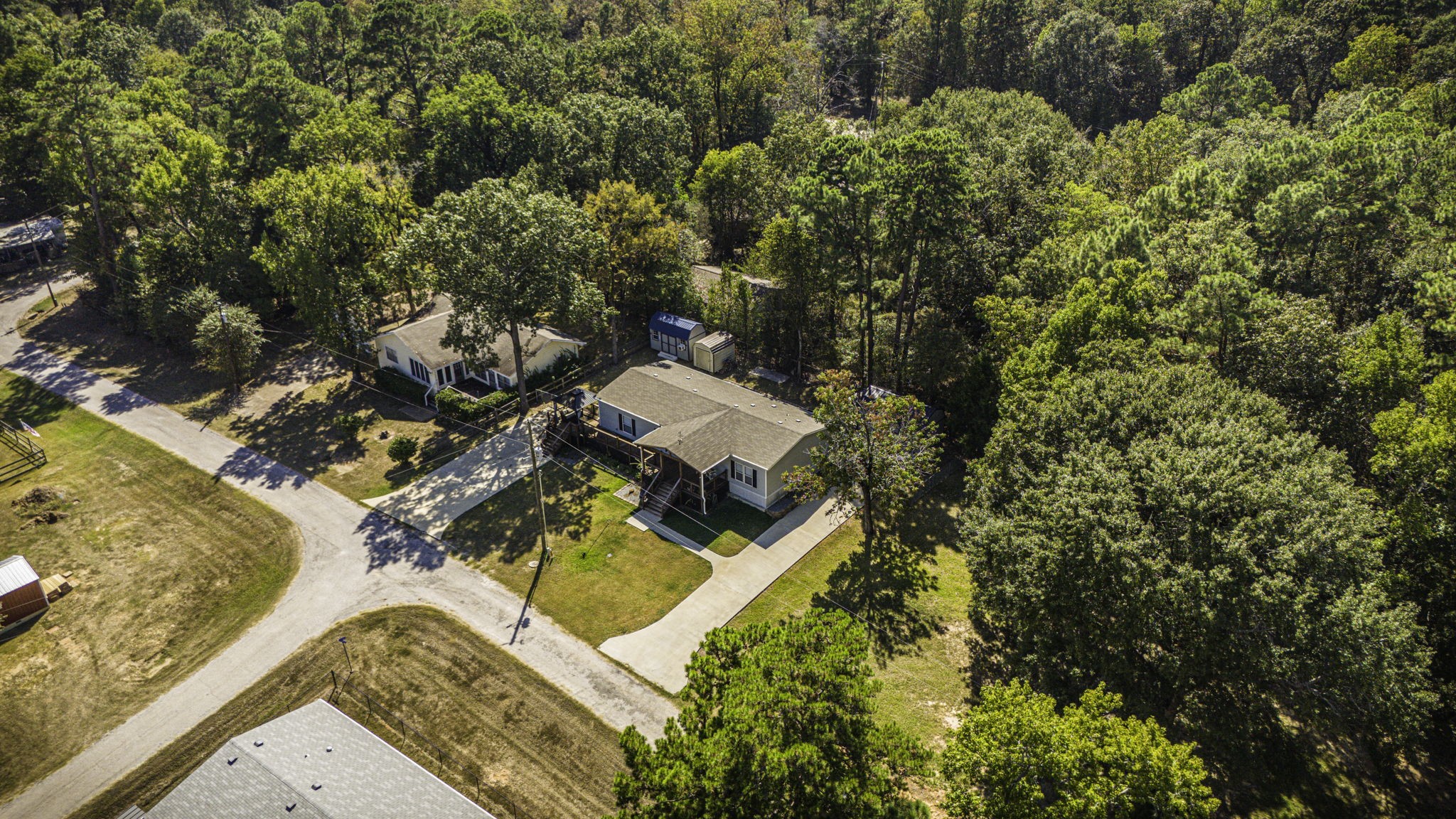 41 Ferguson Way Point Blank, TX 77364 - Photo 27 of 34 view of a house with a yard and sitting area