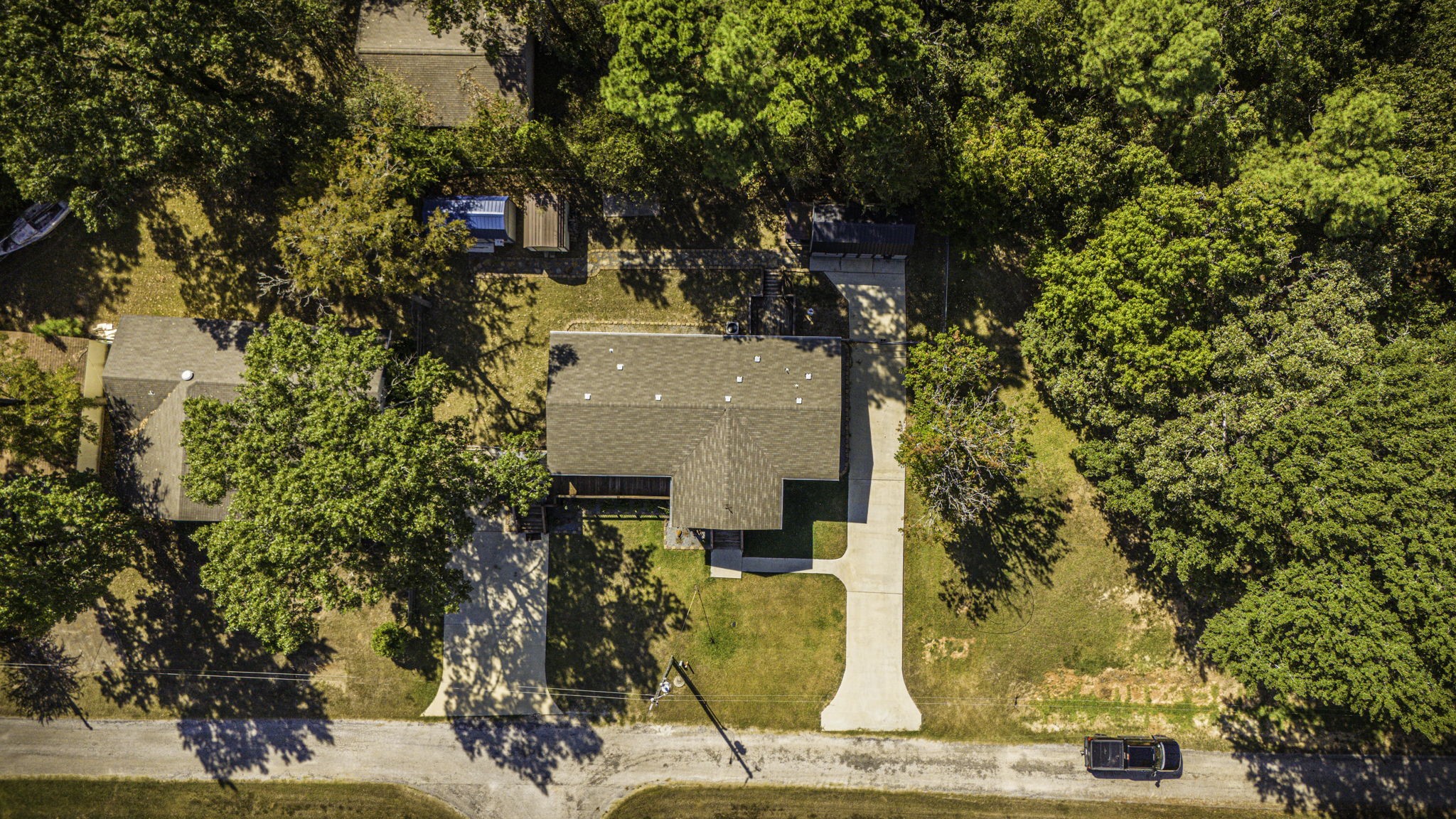 41 Ferguson Way Point Blank, TX 77364 - Photo 30 of 34 view of the house with large trees