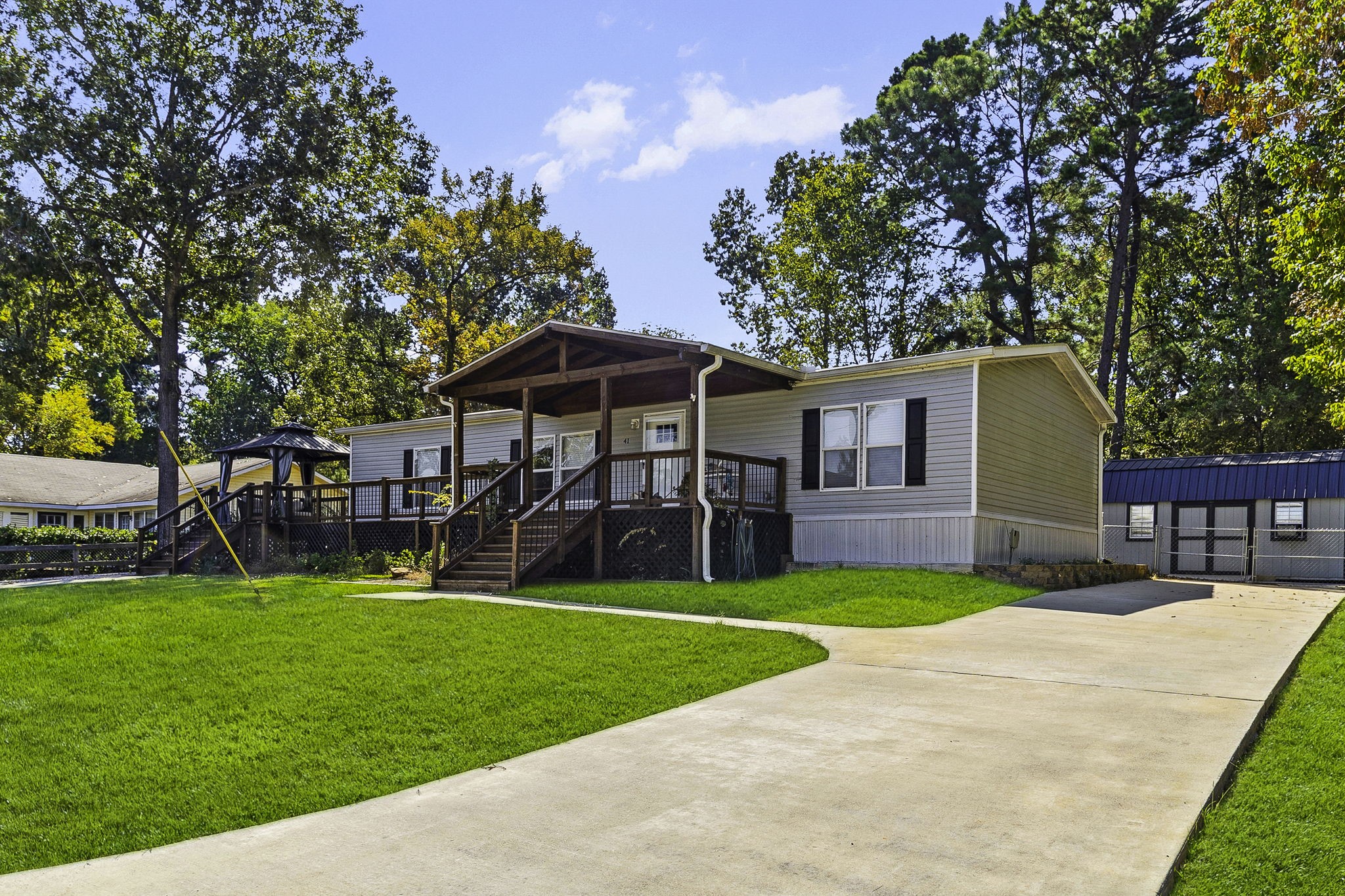 41 Ferguson Way Point Blank, TX 77364 - Photo 3 of 34 a view of a house with a yard and sitting area