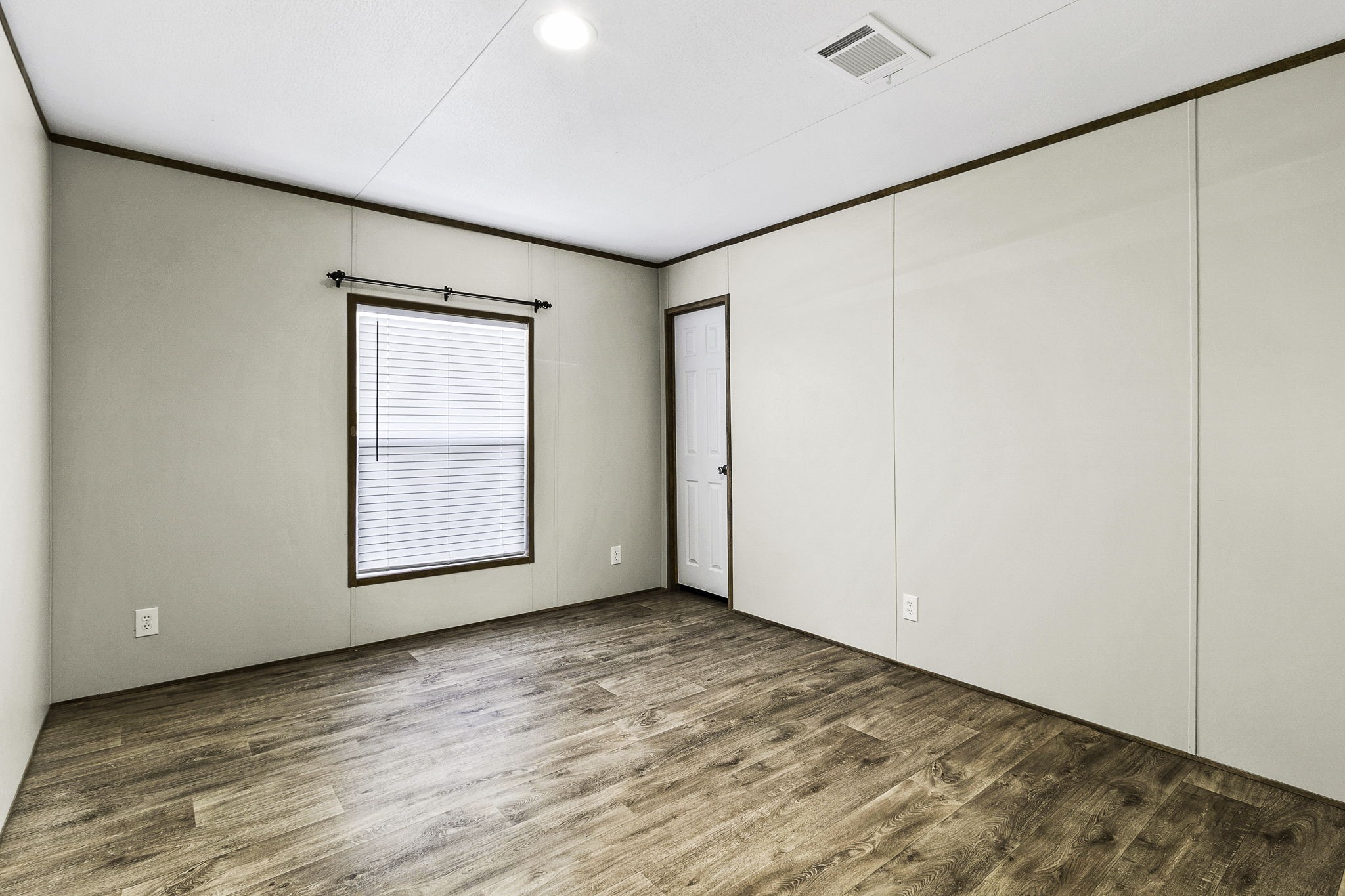 41 Ferguson Way Point Blank, TX 77364 - Photo 10 of 34 an empty room with a empty space and windows