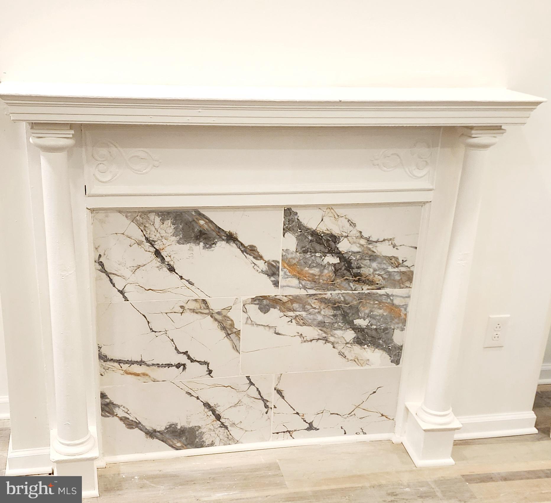 33 North Ruby Street Philadelphia, PA 19139 - Photo 10 of 41 Living Room Fireplace design