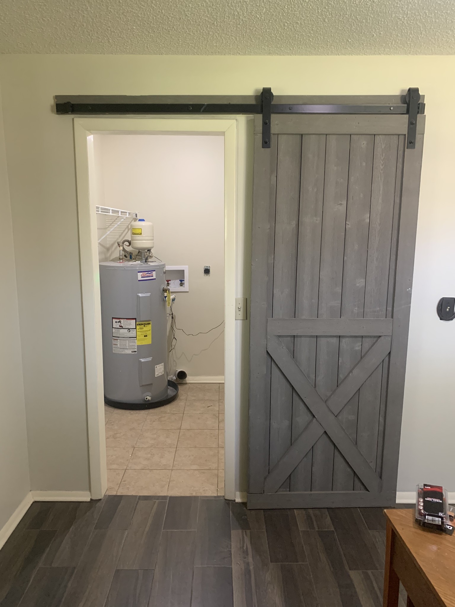 146 Cheatham Road Ardmore, TN 38449 - Photo 12 of 53 a view of a hallway with wooden floor and a cabinet