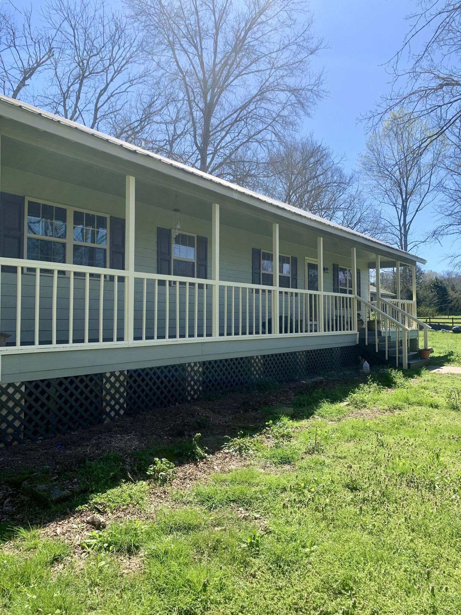 146 Cheatham Road Ardmore, TN 38449 - Photo 16 of 53 a view of a house with a yard
