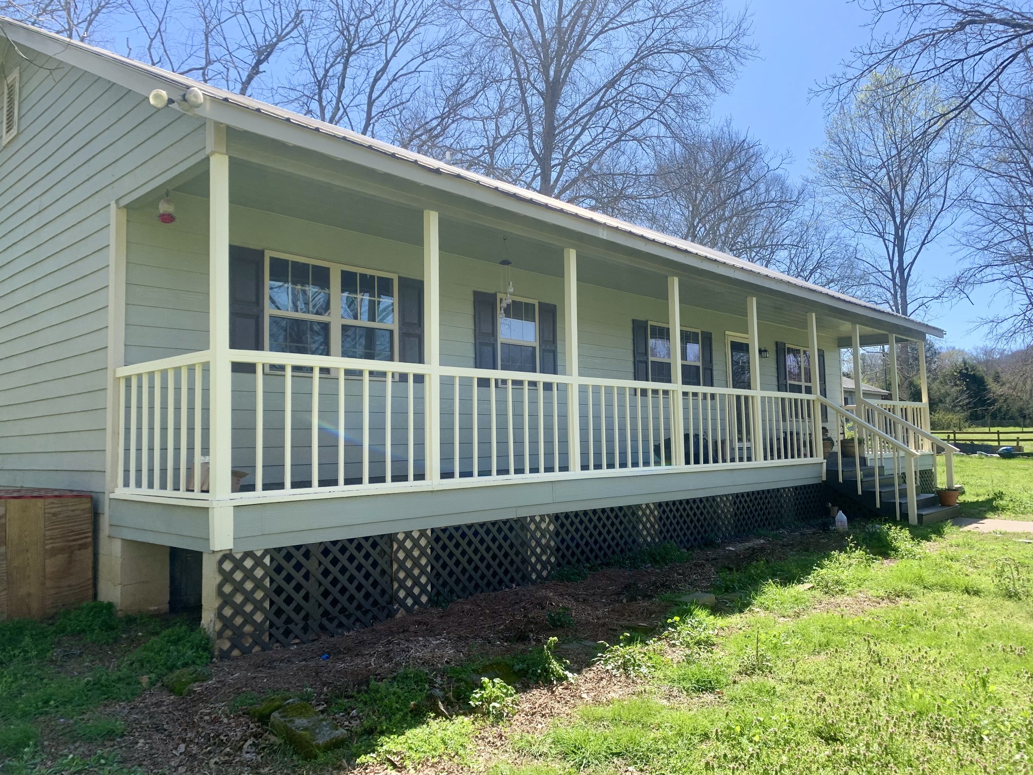 146 Cheatham Road Ardmore, TN 38449 - Photo 2 of 53 a view of a house with a yard and wooden fence