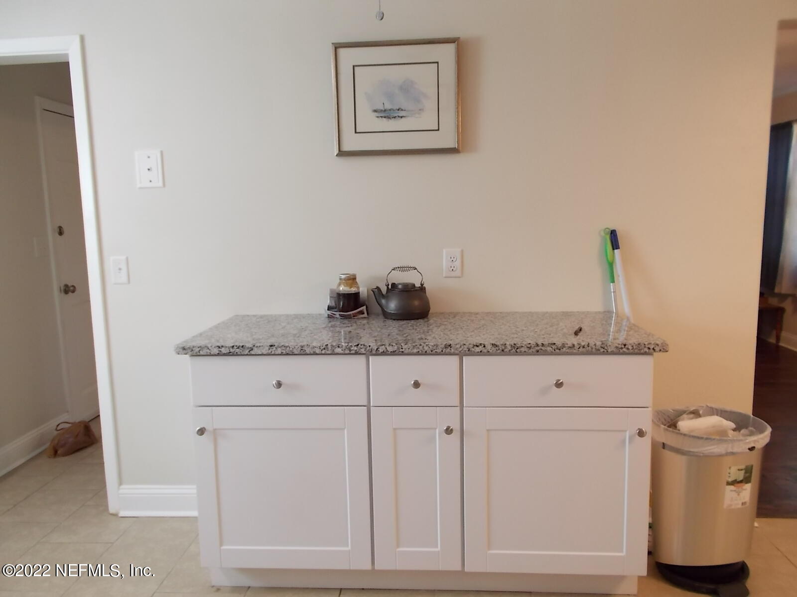6821 Heidi Road Jacksonville, FL 32277 - Photo 4 of 22 a bathroom with a granite countertop sink and a toilet
