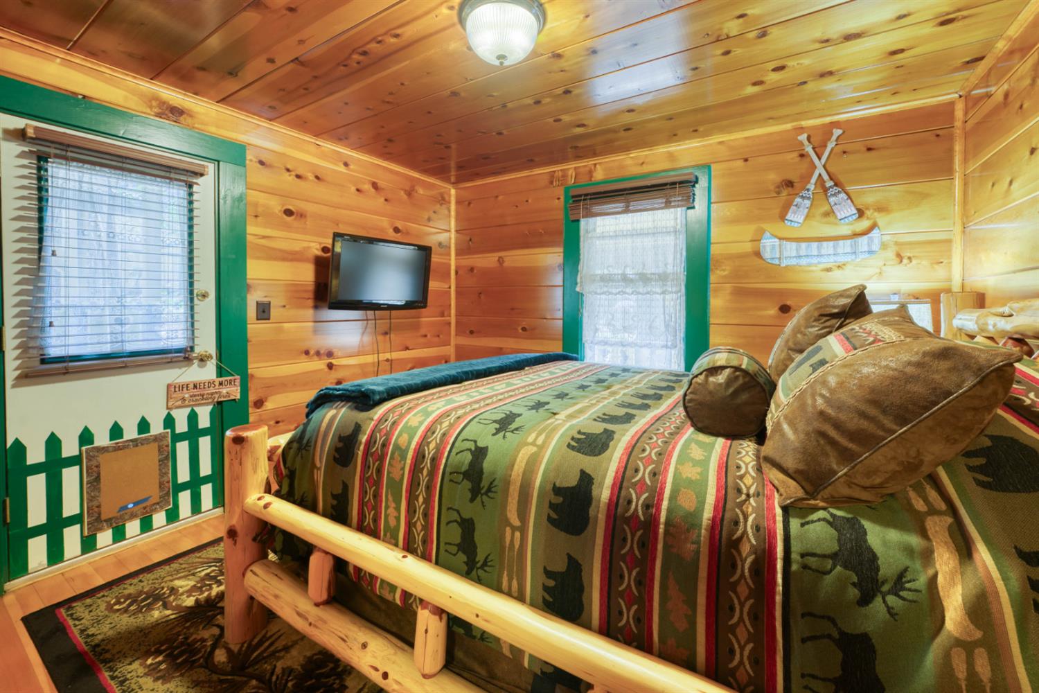 42025 Tollhouse Road Shaver Lake, CA 93664 - Photo 42 of 64 a bedroom with a bed and window