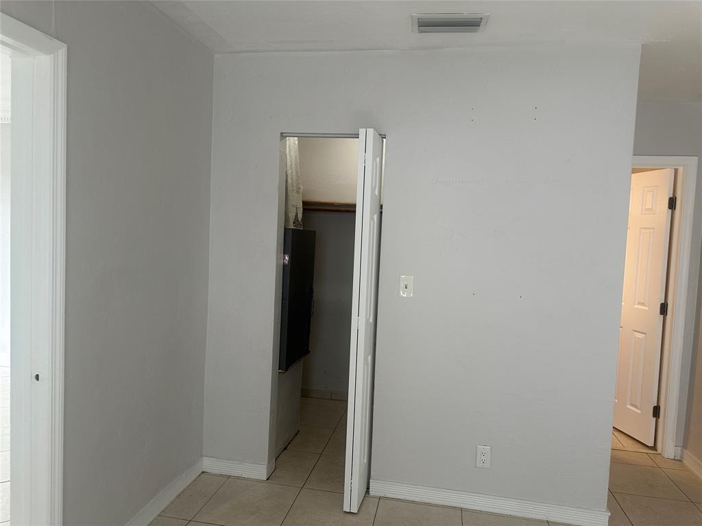 6109 Southwest 30th Street, Unit 4 Miramar, FL 33023 - Photo 13 of 16 a view of a hallway with a hallway