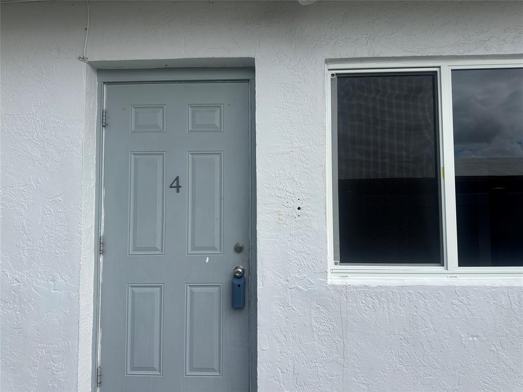 6109 Southwest 30th Street, Unit 4 Miramar, FL 33023 - Photo 4 of 16 a view of front door