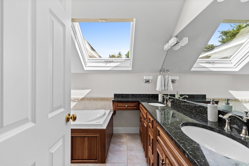86 Allen Farm Lane Concord, MA 01742 - Photo 18 of 34 a kitchen that has a sink and a stove