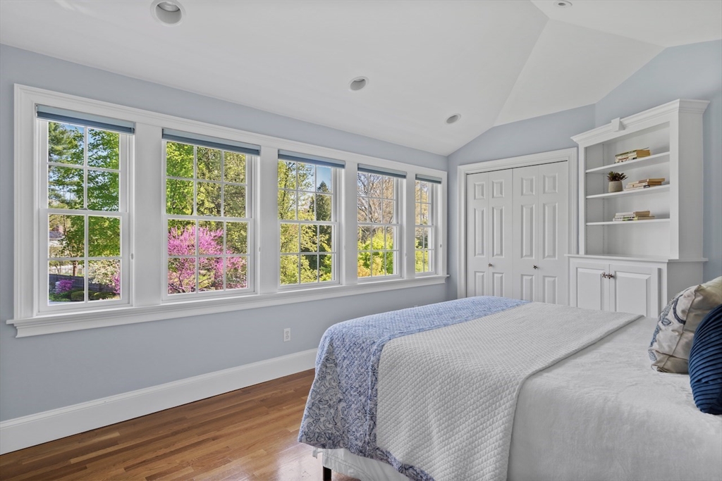 86 Allen Farm Lane Concord, MA 01742 - Photo 20 of 34 a bedroom with a bed and a large window