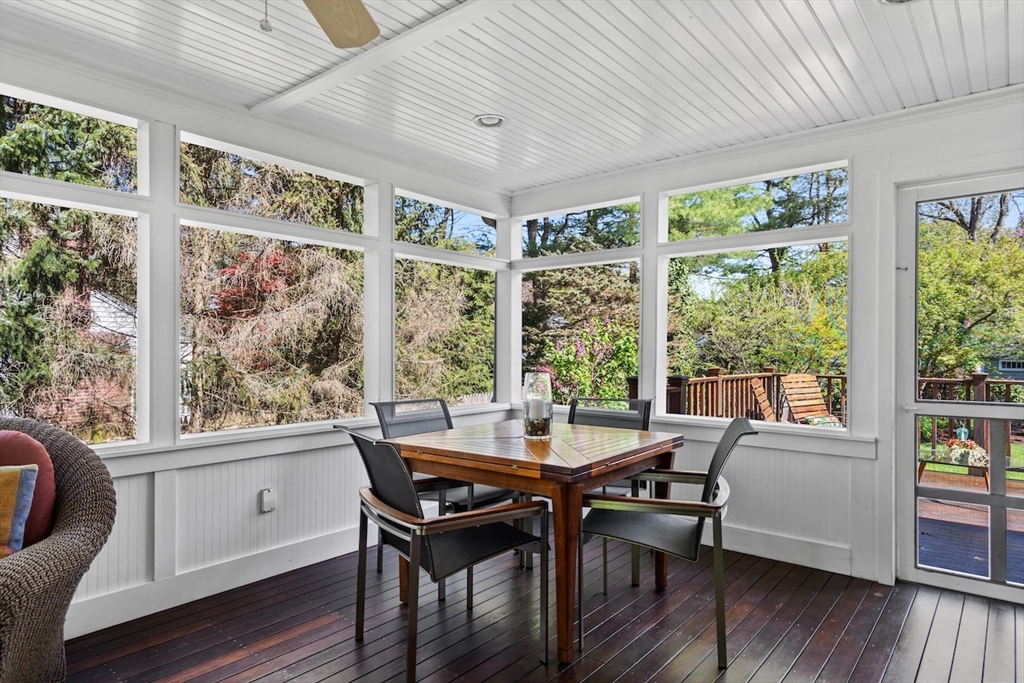 86 Allen Farm Lane Concord, MA 01742 - Photo 27 of 34 a view of a dining room with furniture window and wooden floor