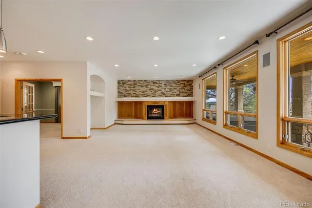 a chandelier and table in a room