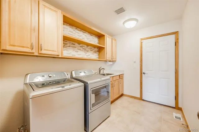 a view of a hallway view with staircase