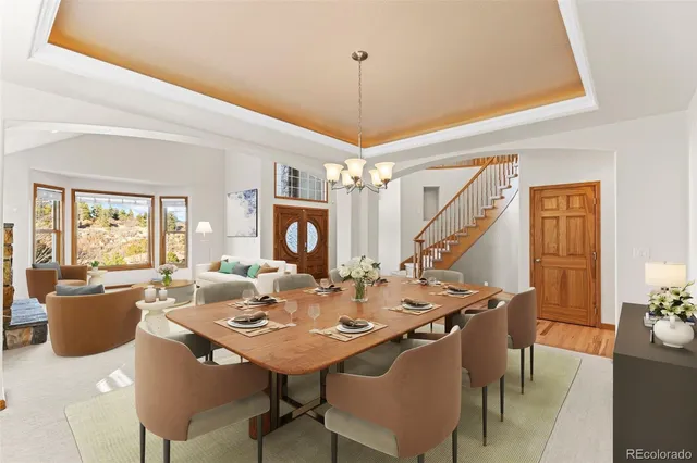 a kitchen with stainless steel appliances granite countertop a stove cabinets and wooden floor