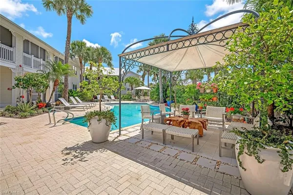 a outdoor living space with furniture and a potted plant